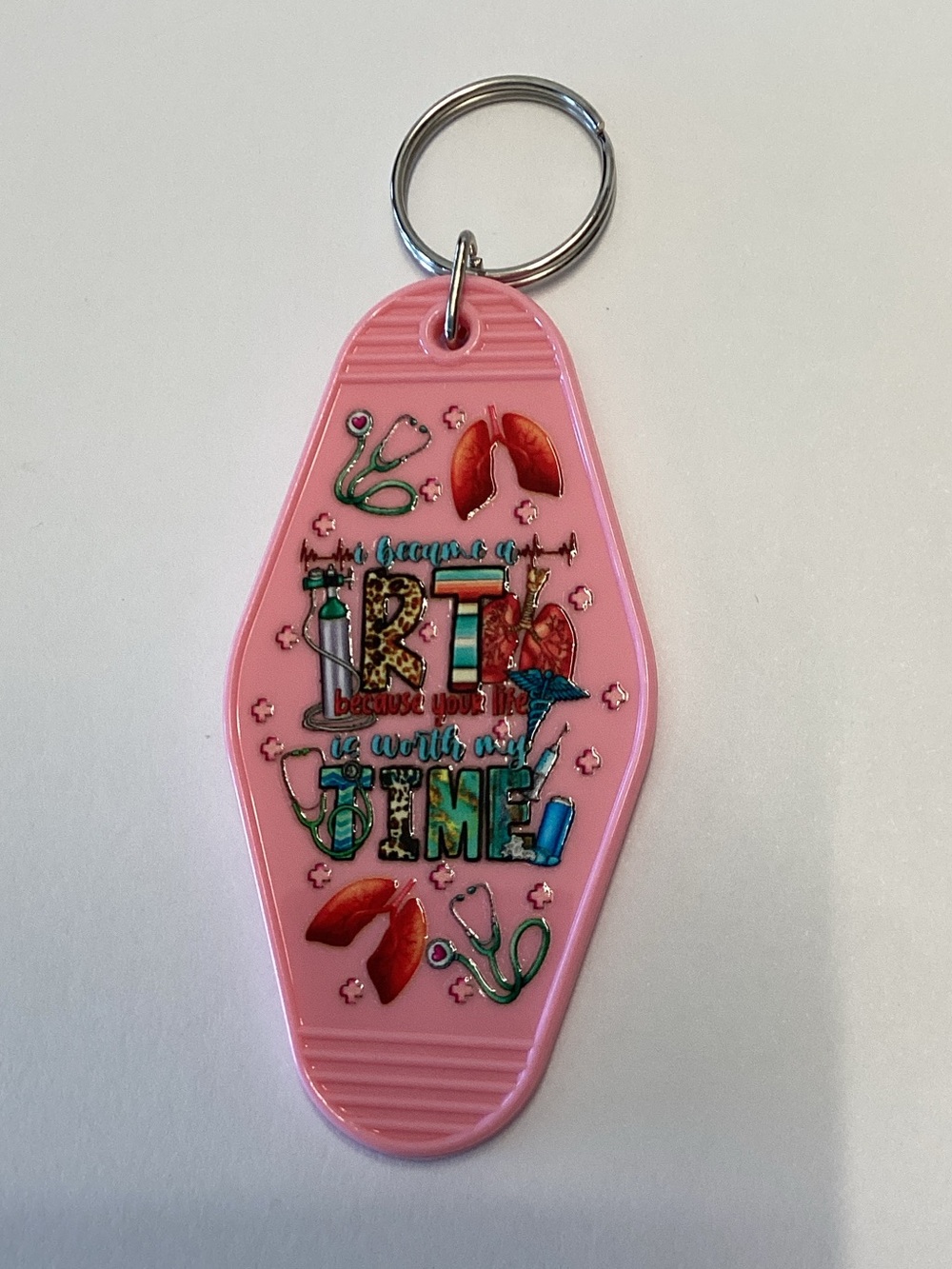 Pink Retro Motel Keychain with Medical Design for an RT